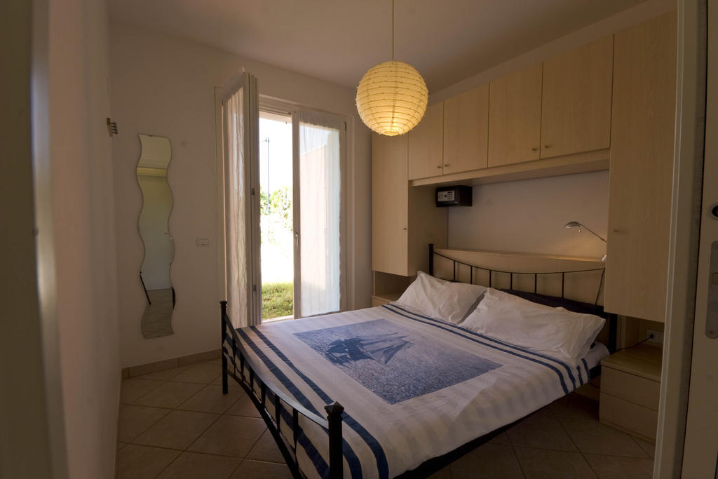 Amarenumana Aparthotel Szoba fotó