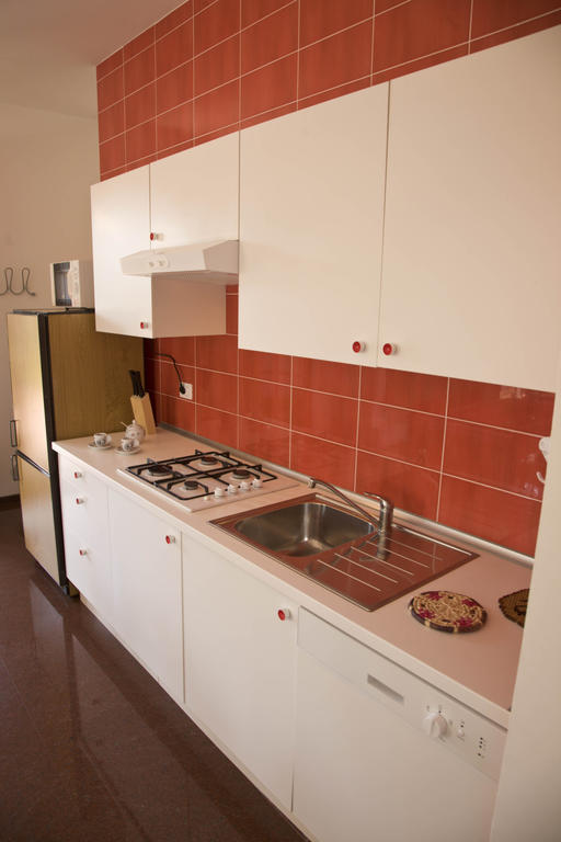 Amarenumana Aparthotel Szoba fotó